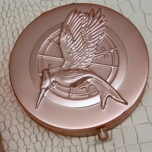 Storybook Cosmetics Beacon Of Hope World Of Hunger Games Pressed Powder Compact